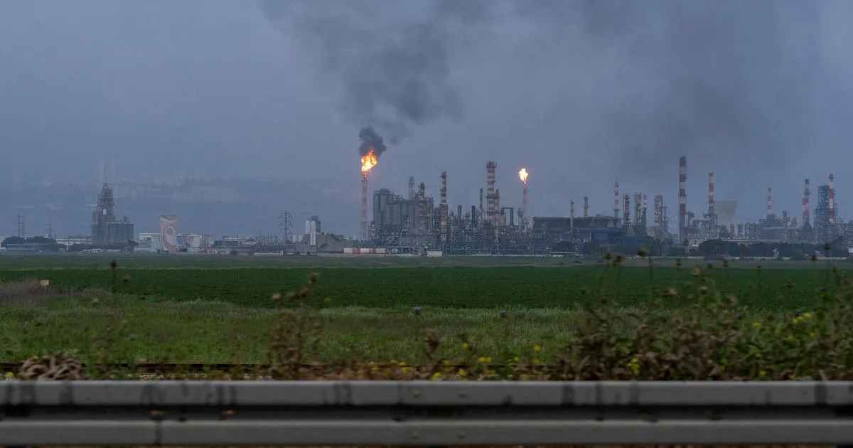 Iranian missile shrapnel hits Haifa oil refinery, no injuries reported - Haaretz