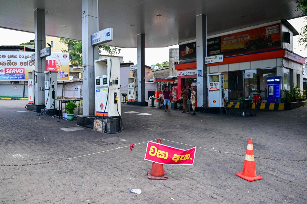 A sign reading 'Closed' is displayed at a Lanka IOC fuel station in Kotahena on the outskirts of Colombo March 17, 2026. — AFP pic 