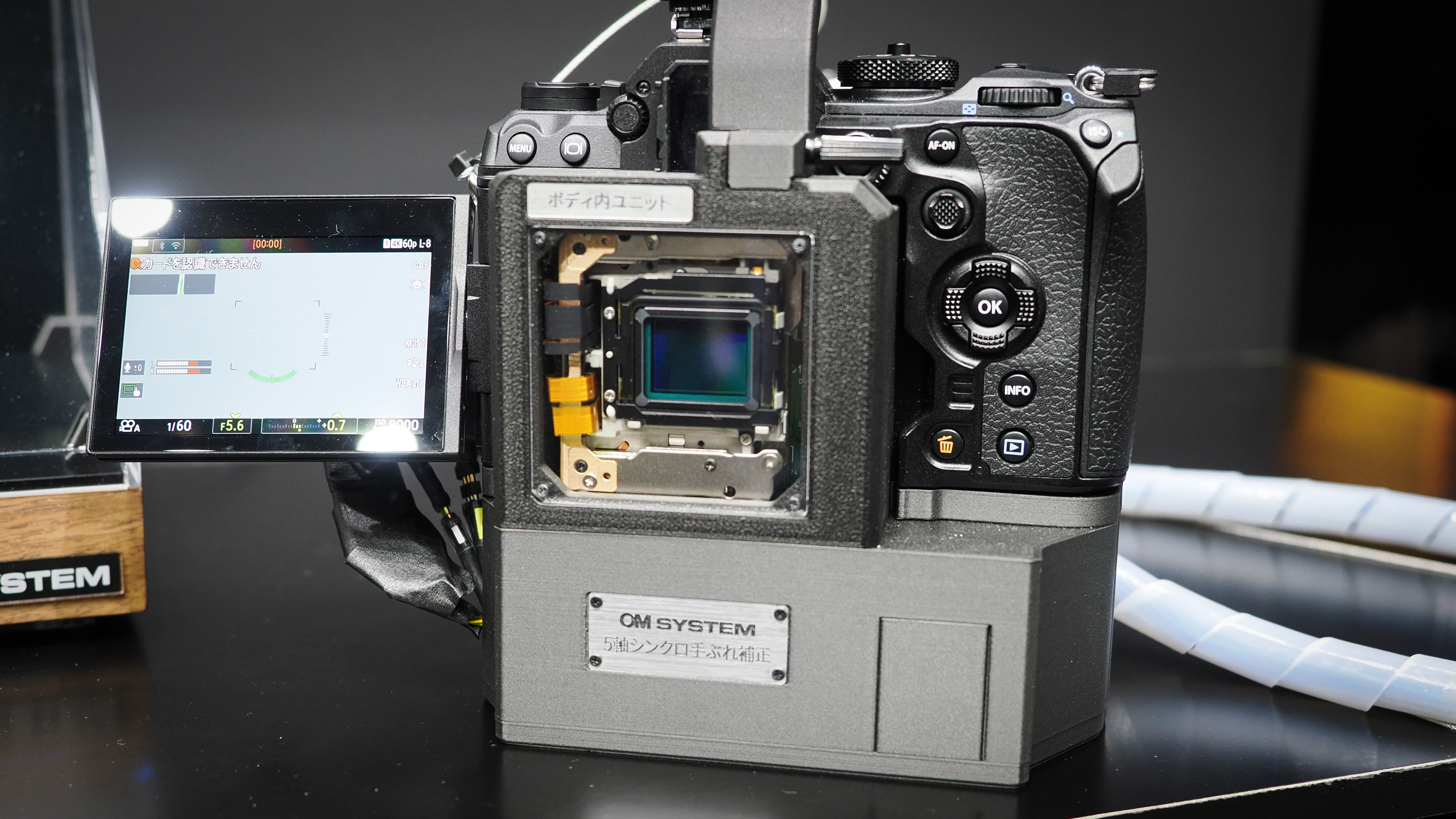 OM System OM-1 Mark II with an exposed IBIS system, on show at CP+ 2026