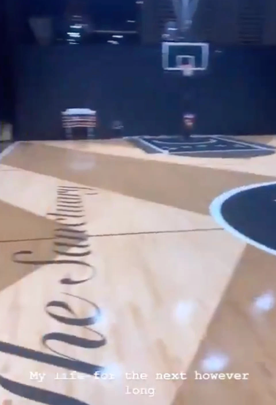 Indoor basketball court with "The Sanctuary" written on the floor. Text overlay reads: "My life for the next however long."