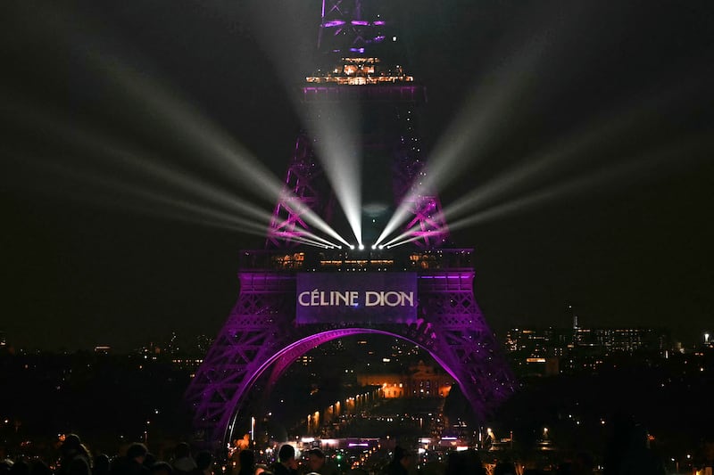 The Eiffel Tower illuminated to celebrate the 58th birthday of singer Céline Dion. Photograph: Anna Kurth/Getty