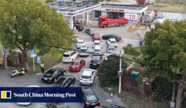 Drivers in China rush to fill petrol tanks ahead of biggest price hike this year