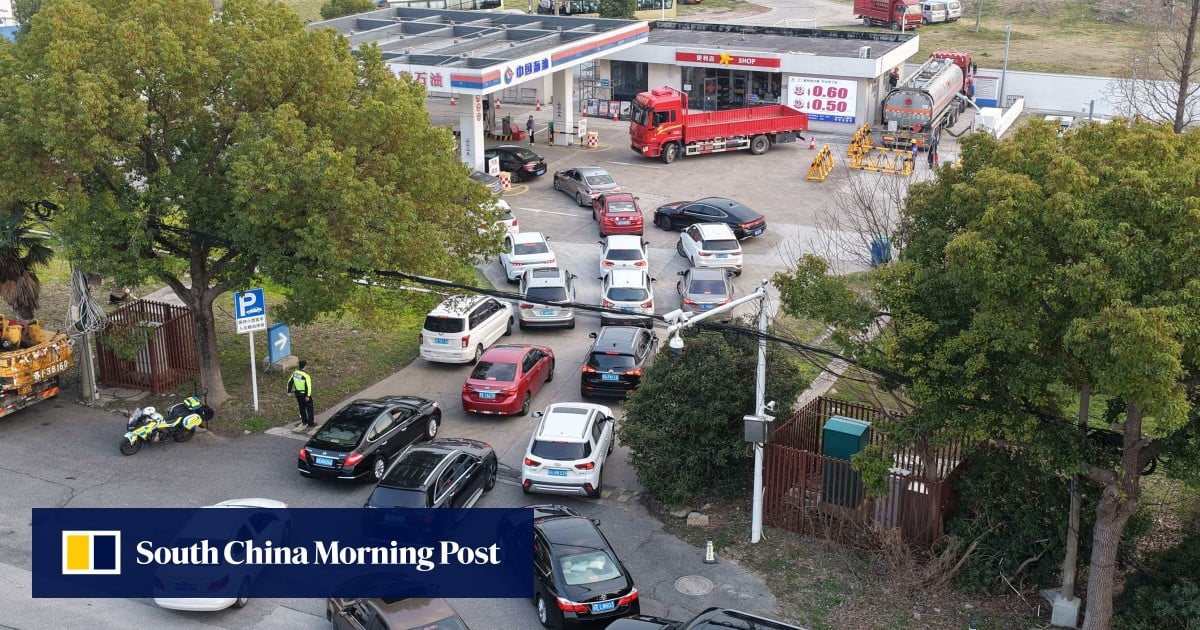 Drivers in China rush to fill petrol tanks ahead of biggest price hike this year