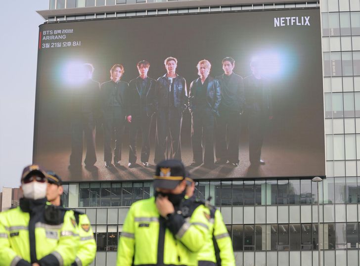 Police officers inspect areas in central Seoul, Wednesday, where BTS  will hold its comeback concert on March 21. Yonhap 