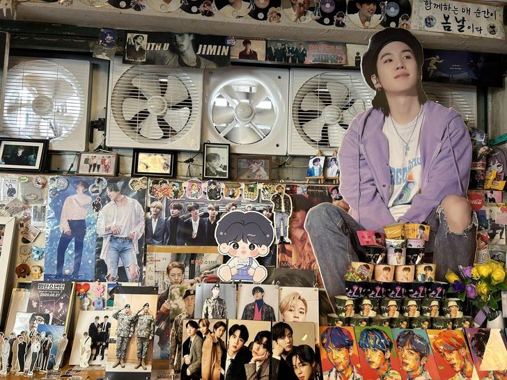 The interior of Yoojung Sikdang, a Korean ssambap (rice lettuce wrap) restaurant in Gangnam District, Seoul, is decorated with posters and fan memorabilia related to K-pop boy band BTS. Captured from X (formerly Twitter) user @ssuny_rachel