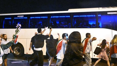 'Save our girls': support shown for Iran players after exit from Women's Asian Cup – video