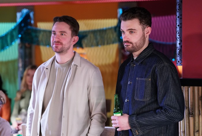Callum Highway and Johnny Carter watching Elaine in EastEnders