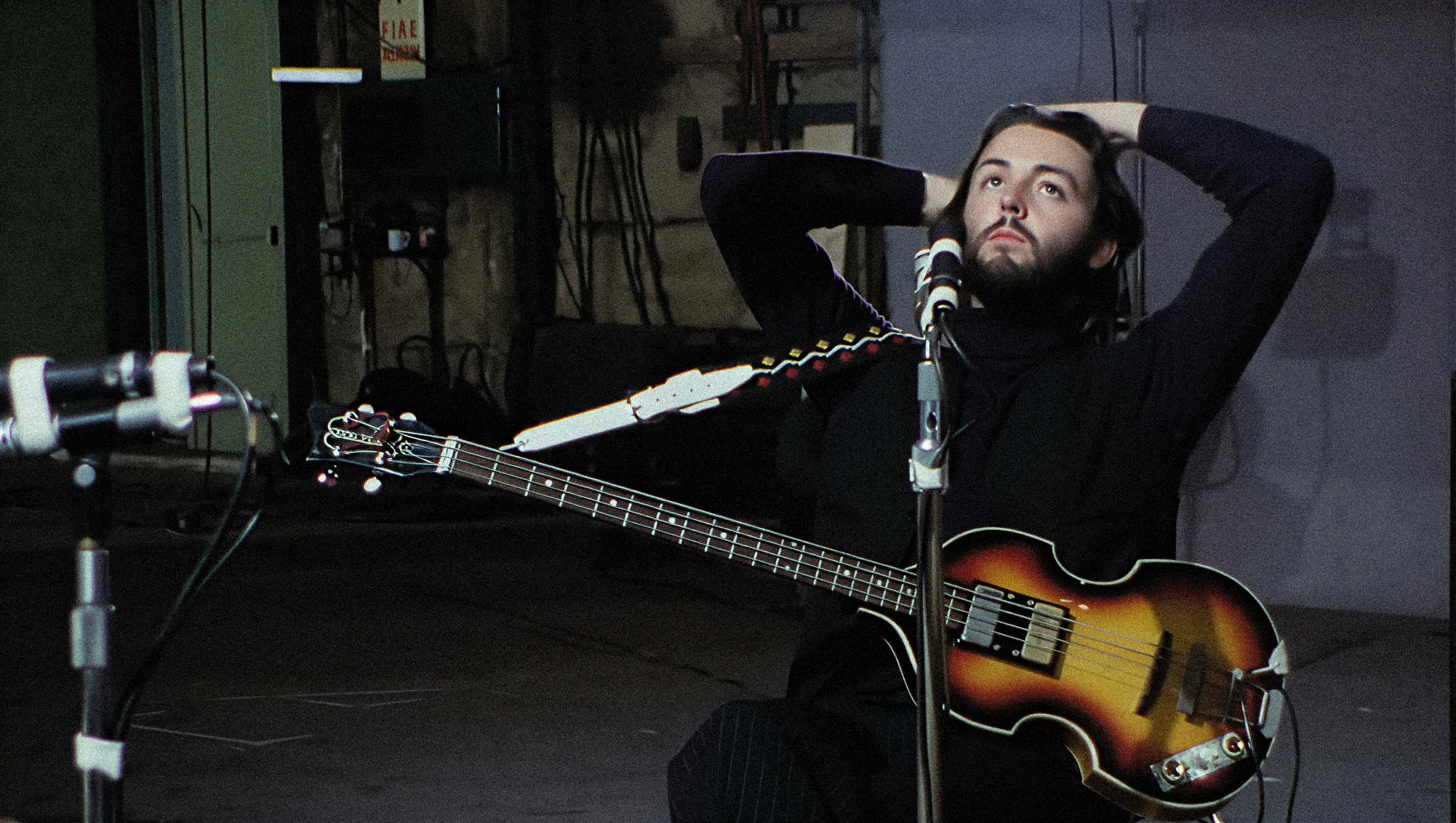 Paul McCartney with his Hofner bass guitar during the Get Back documentary.