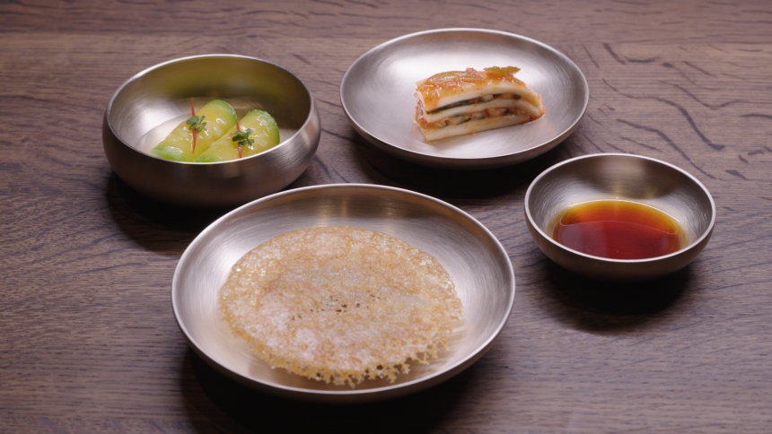 Corey Lee serves creative, East Asian-inspired dishes at Benu in San Francisco. This Korean-style dumpling is filled with pheasant and vegetables, and accompanied by 10-year-aged soy sauce, preserved green plum geotjori kimchi, and cold squash soaked in pheasant stock.