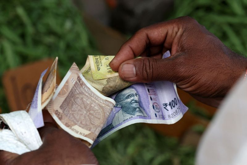 Indian rupee hits record low past 95/USD as relief from RBI's FX curbs proves fleeting