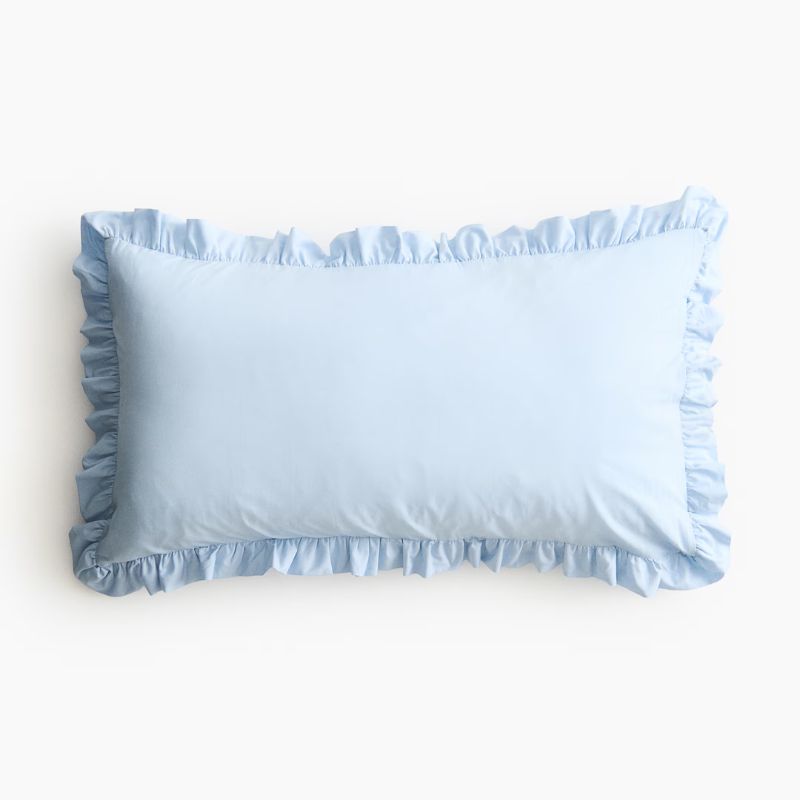 light blue cushion with ruffle edge