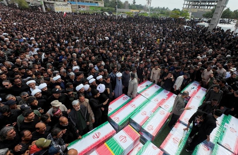 People attend the funeral of the victims following a reported strike on a school in Minab, Iran, March 3, 2026.