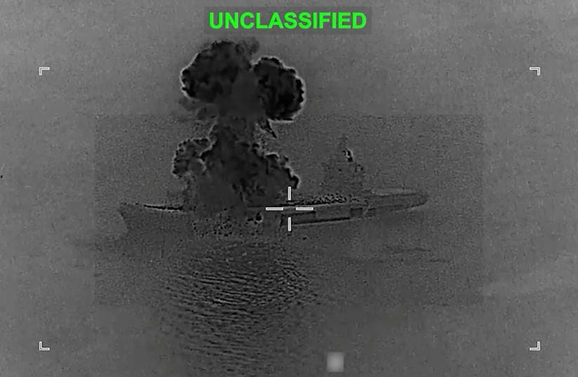 Smoke rises from what US Central Command (CENTCOM) says is an Iranian drone carrier that was struck by US forces, amid the US-Israeli conflict with Iran, at an unknown location, in this screen grab taken from a handout video released on March 5, 2026.