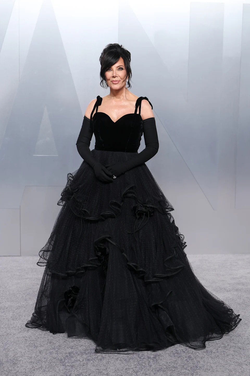 Kris Jenner at the 2026 Vanity Fair Oscars Party wearing vintage Valentino couture.