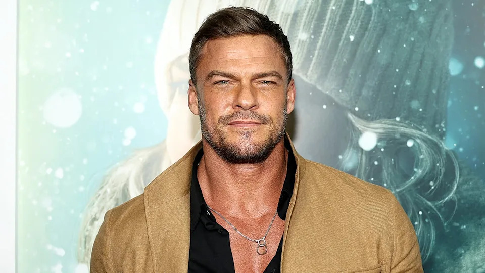 Luke Evans wearing a casual jacket and shirt at an event