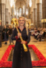 Dame Laura Kenny carrying the Commonwealth Mace 