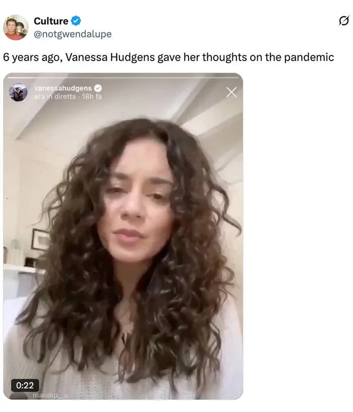 Person with curly hair in a home setting talking in a video, mentioned in a tweet about reactions to the pandemic