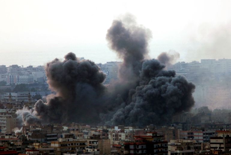 In this July 15, 2006 photo, an Israeli air strike hits the residential area which is a Hezbollah stronghold, in the southern suburbs of Beirut, Lebanon 