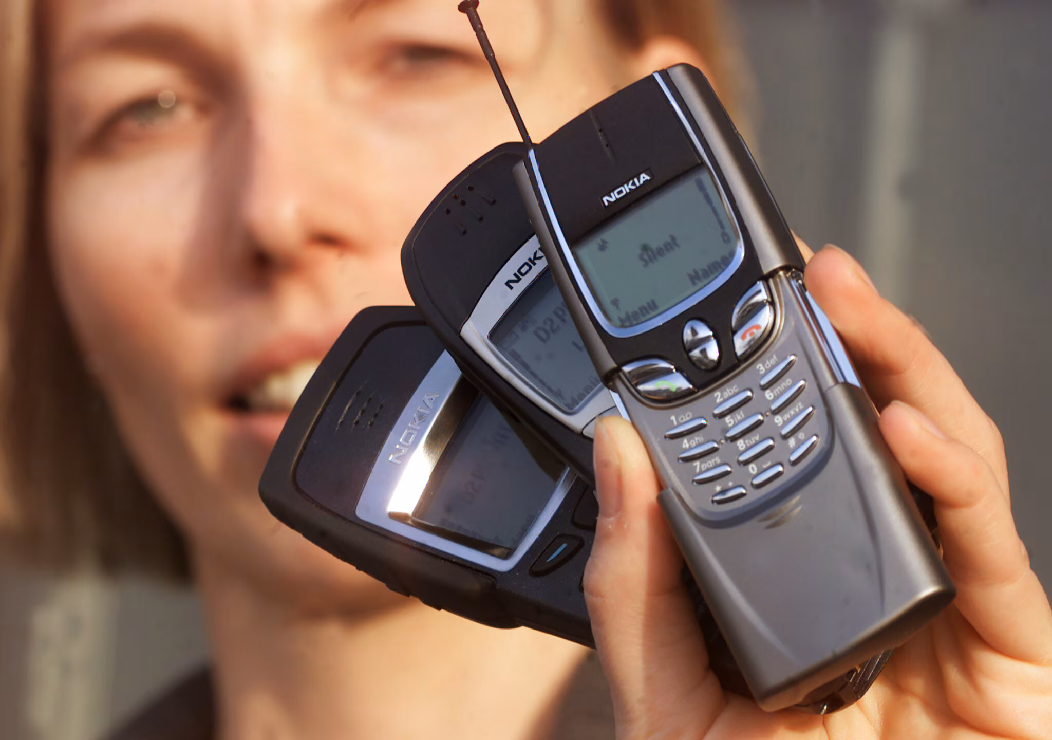 A model displays Nokia's new mobile phones, the 6250, a shock resistant and waterproof phone, the so called 