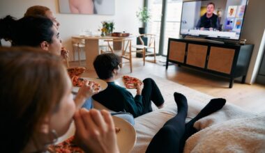 Gen Z college students reviewing HPV vaccination information on a phone and laptop