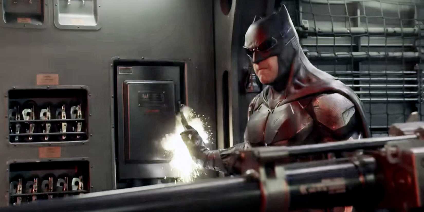 Batman wearing his tactical suit and goggles in Justice League