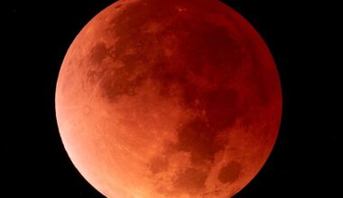 The moon looks deep red on the right side and light red on the left side.