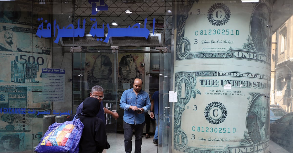 Foreign outflows push Egypt's pound to its lowest official level on record