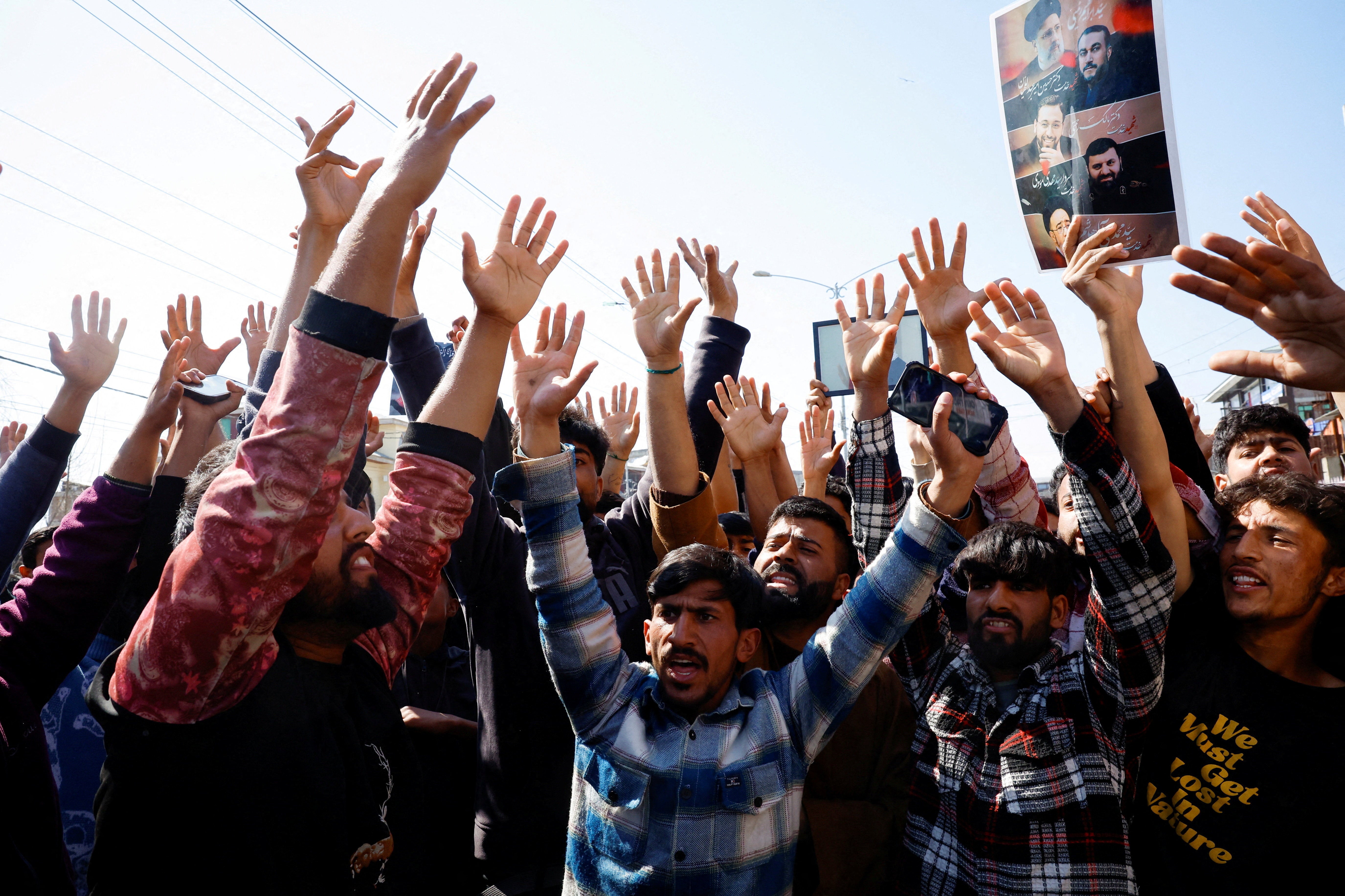 Shi’ite Muslim men protest and chant anti-US and anti-Israel slogans during a demonstration following the killing of Iran's supreme leader Ayatollah Ali Khamenei in Israeli and US strikes on Saturday, in Magam town, Central Kashmir
