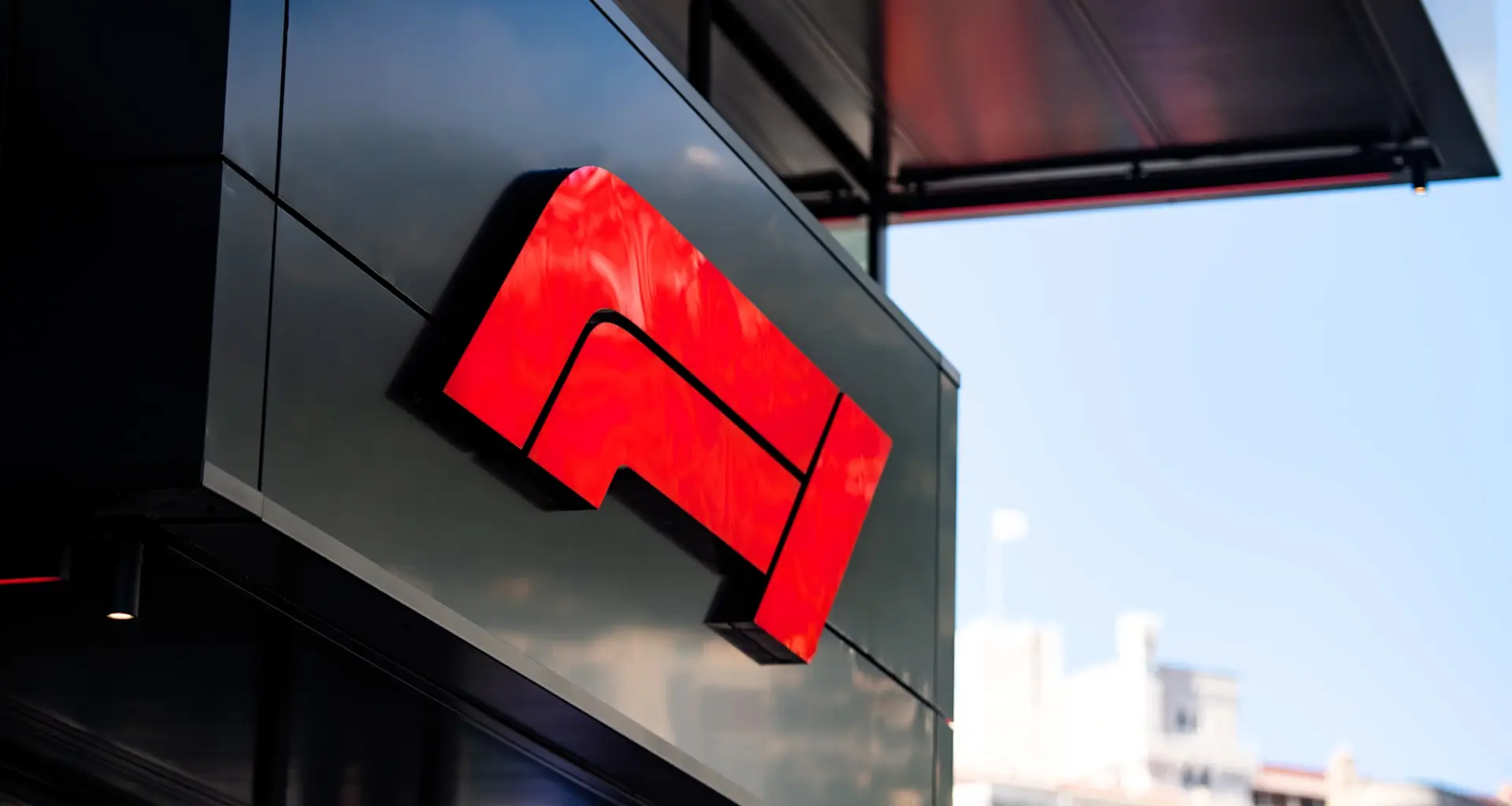 SHANGHAI, CHINA - MARCH 12: Lando Norris of Great Britain and McLaren walks in the Paddock during