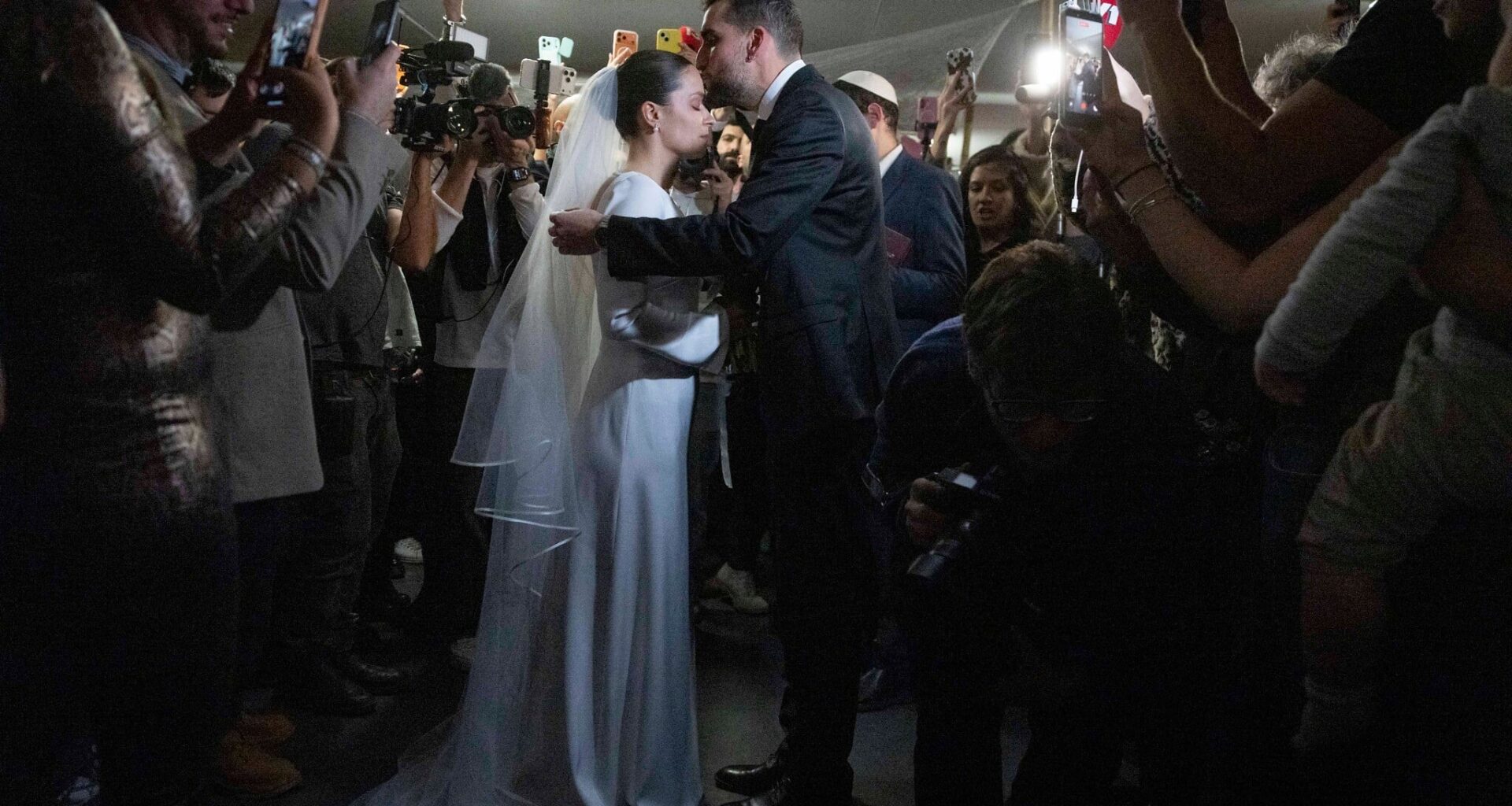 Wedding sirens: Under fire, Israeli couple ties the knot in bomb shelter