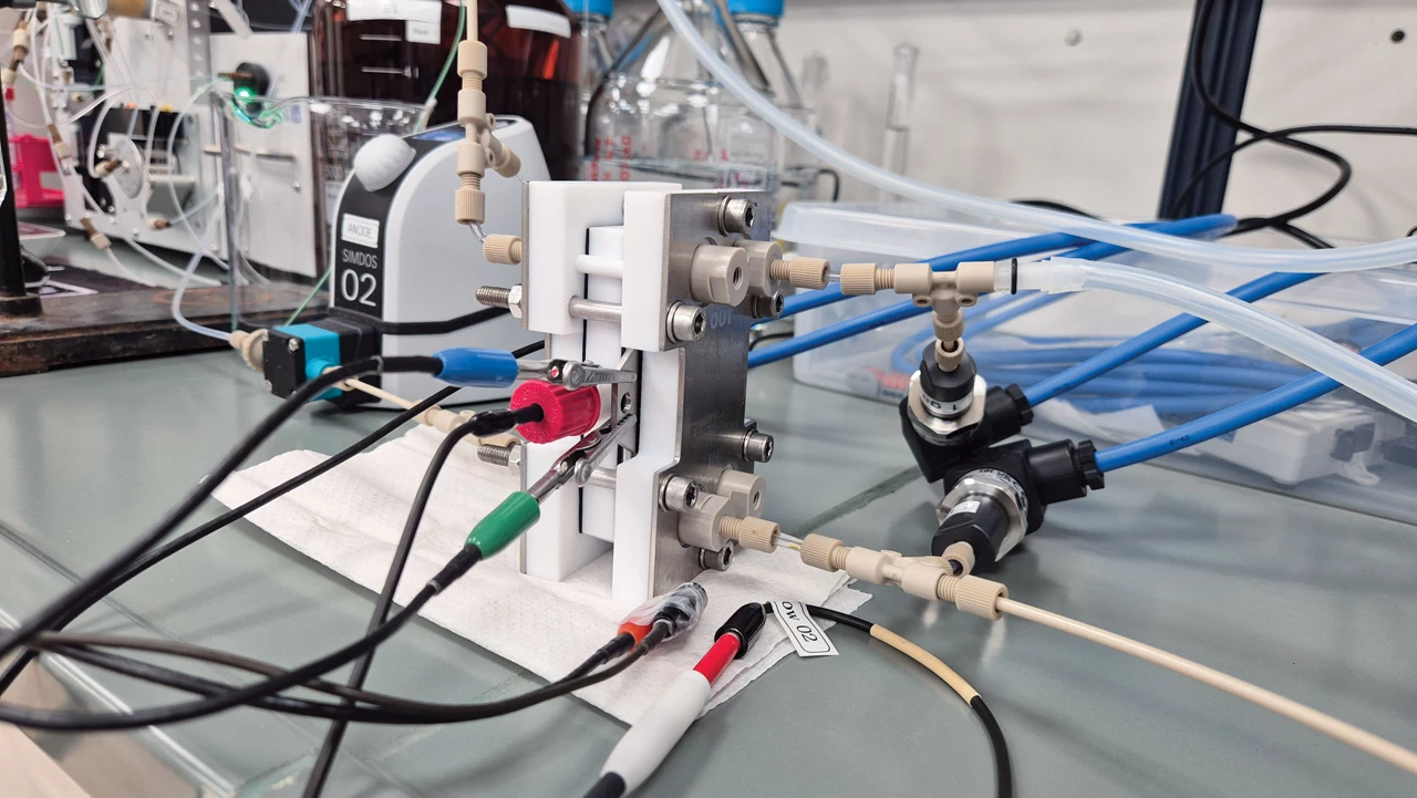 Wires and tubes emerge from a small tabletop device.