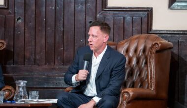 Peter Thiel warned AI is coming for 'math people before word people.' Banks see smaller payrolls