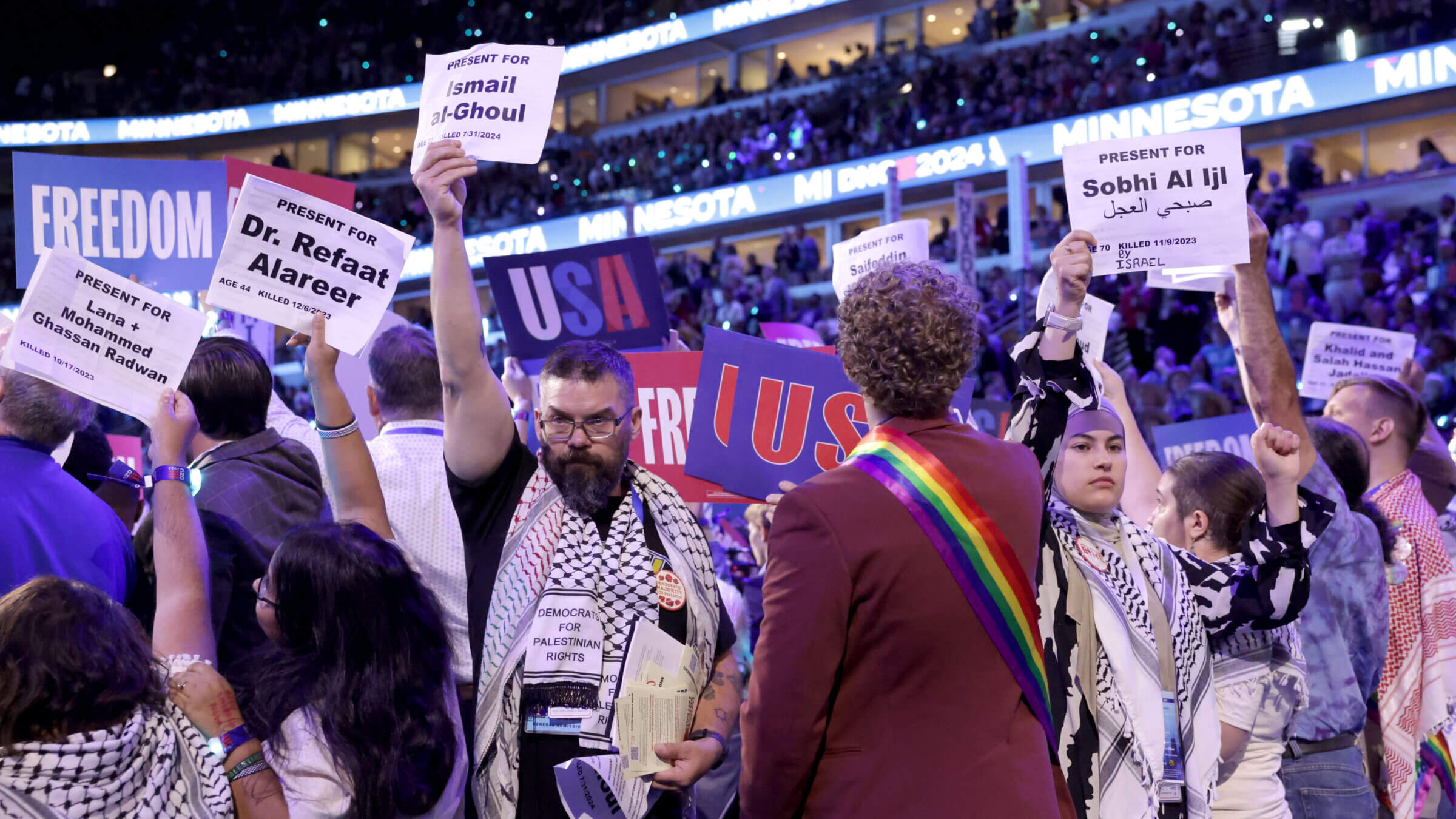 A protest listing names of people killed by Israel during Minnesota roll call  at the 2024 Democratic National Convention at United Center in Chicago.