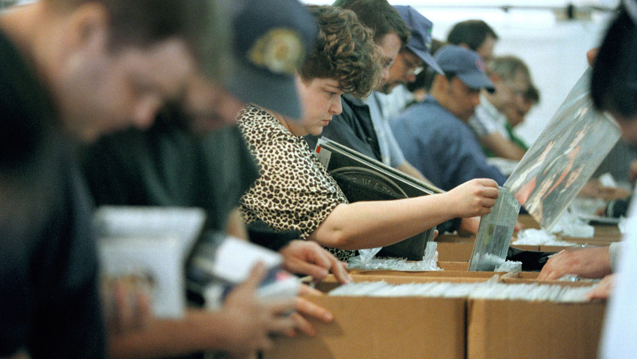 Digging through vinyl records