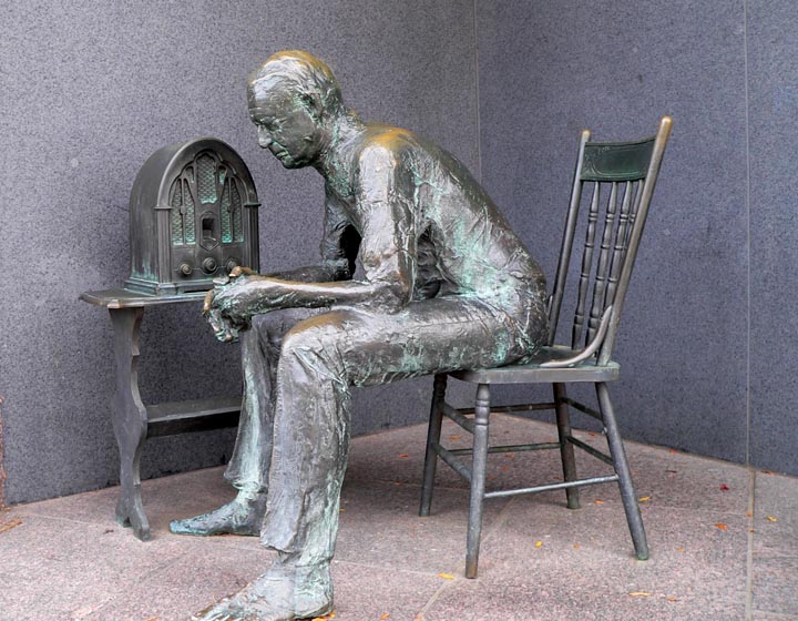 Great Depression sculpture (man sitting listening to radio).