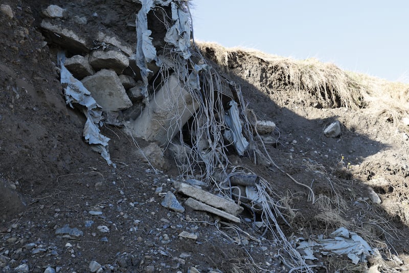 Erosion at the north beach at Greystones. The soil erosion has revealed plastic sheeting, ropes, metals, electrical cables, pipes  and what appears to be construction and demolition material. Photograph: Nick Bradshaw