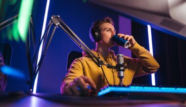 Professional cyber sportsman drinking out of can to wake up and concentrate on computer game.