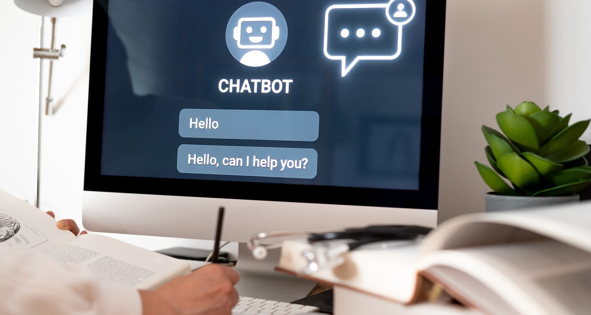 Medical student is taking notes while using an ai-powered chatbot on a computer, enhancing learning and exploring future possibilities of healthcare with technology