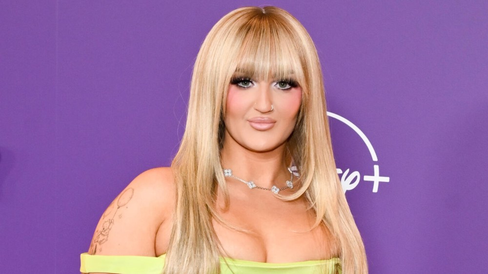 Mikayla Nogueira dons a blond wig at the "Hannah Montana 20th Anniversary Special."