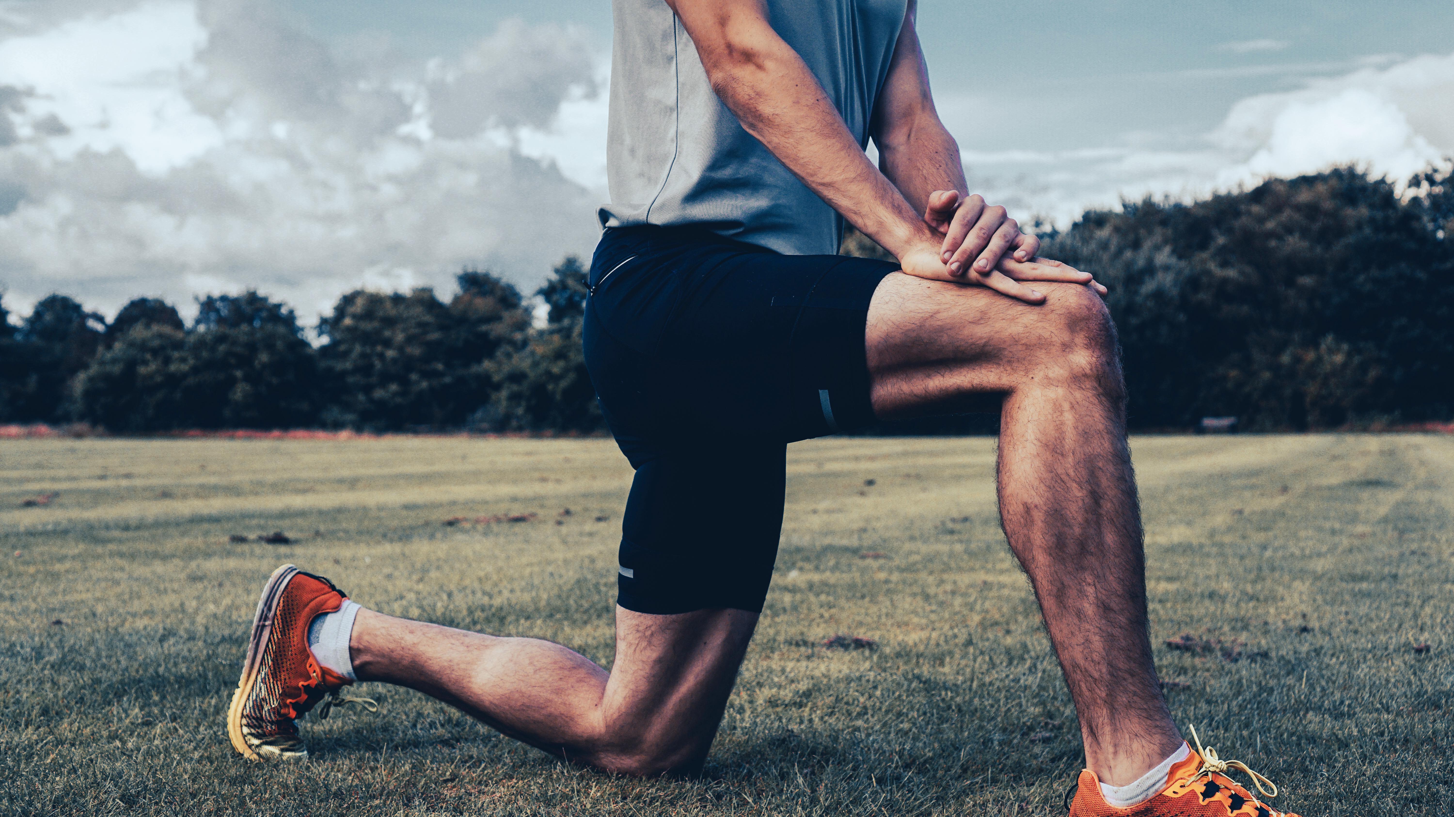 a man doing a hip flexor stretch