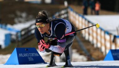 A female sit skier is racing