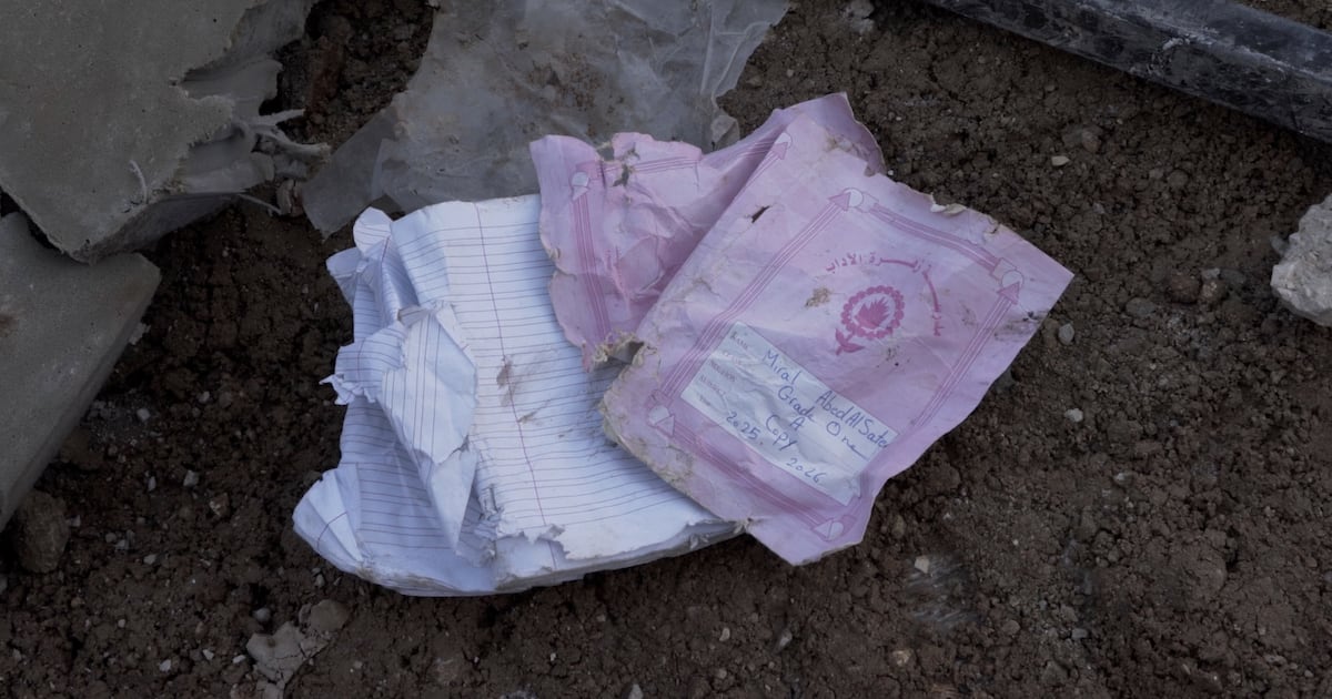 Pink schoolbook left behind in rubble tells story of 83 Lebanese children killed by Israel