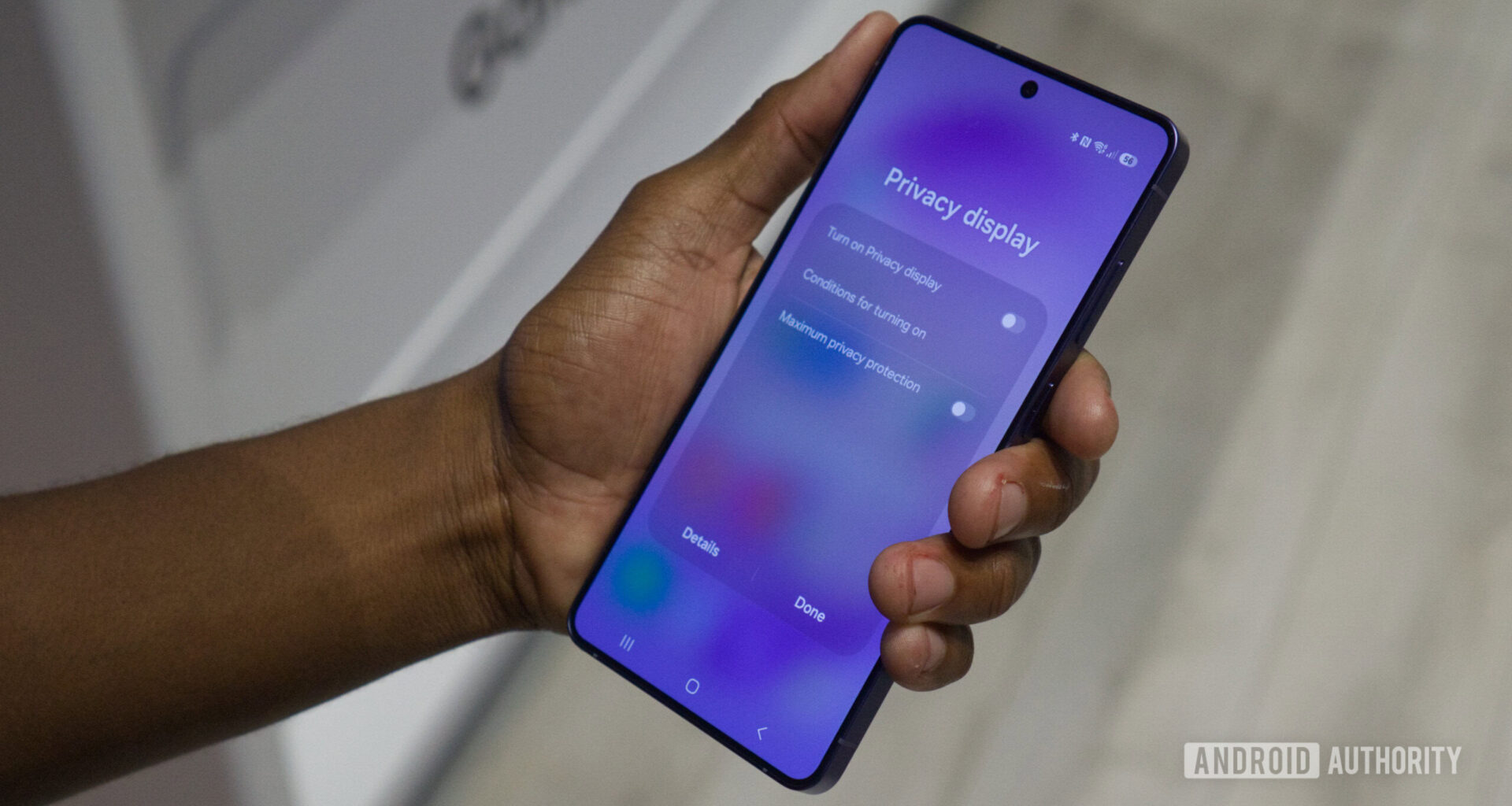 Samsung Galaxy S26 Ultra in hand showing Privacy Display quick settings