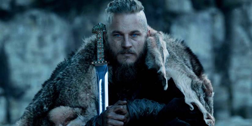 Travis Fimmel as Ragnar Lothbrok with a sword in Vikings