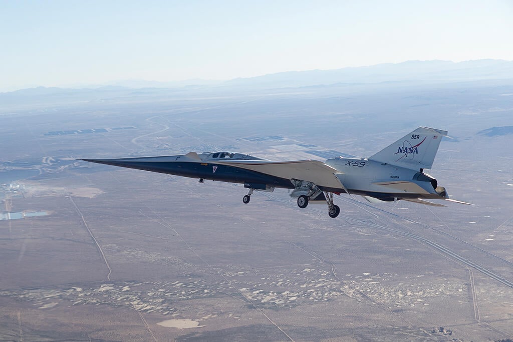 X-59 flying over land