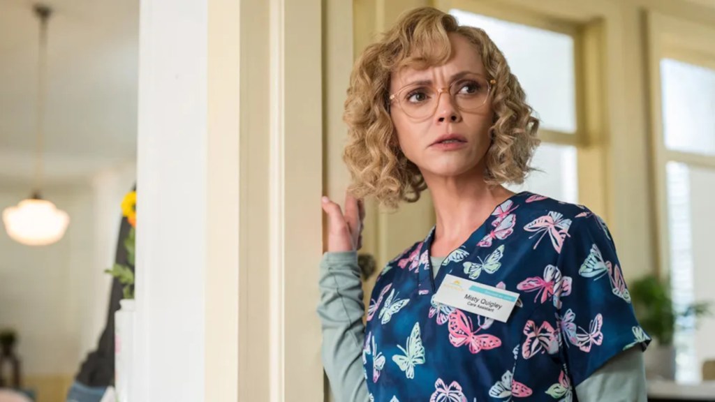 Adult Misty looking intrigued in Yellowjackets