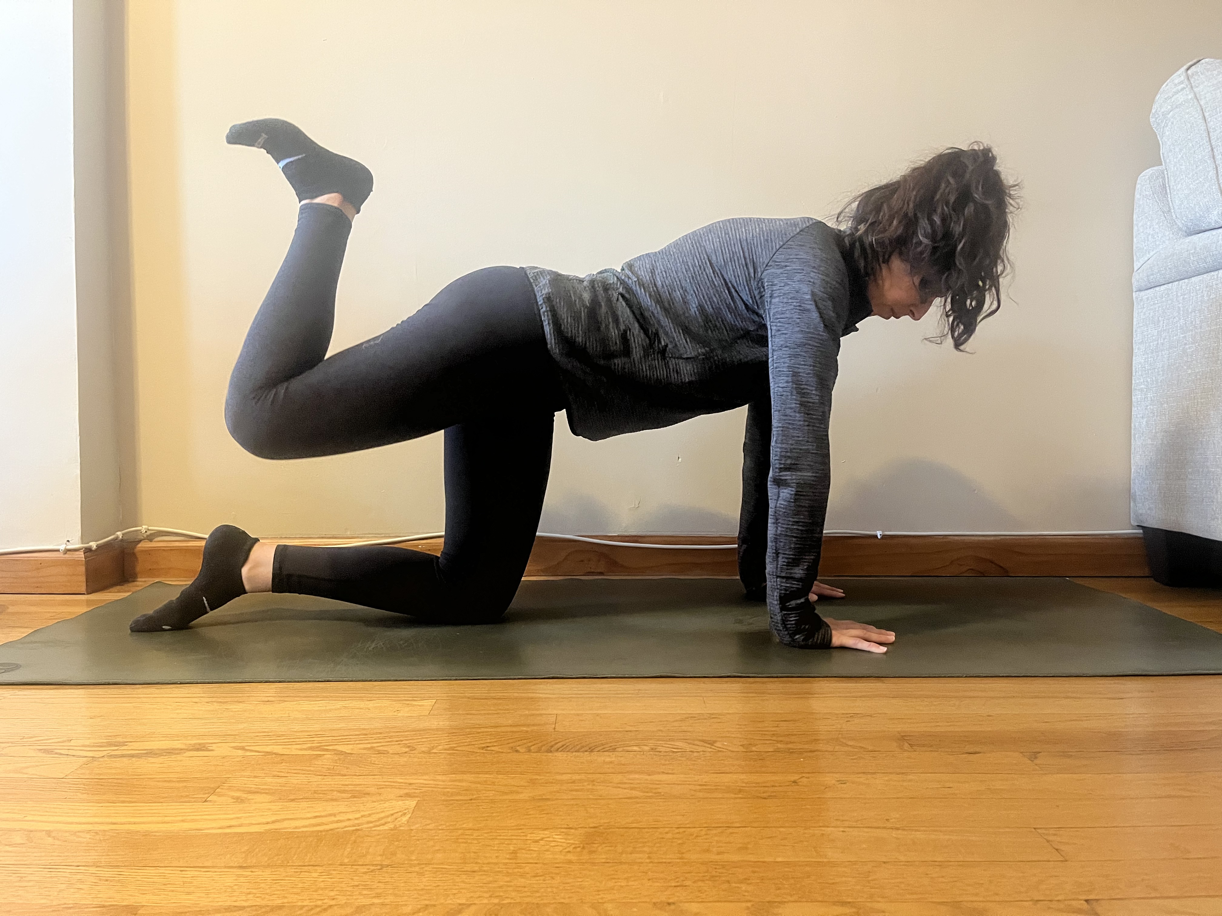 Woman demonstrates exercise