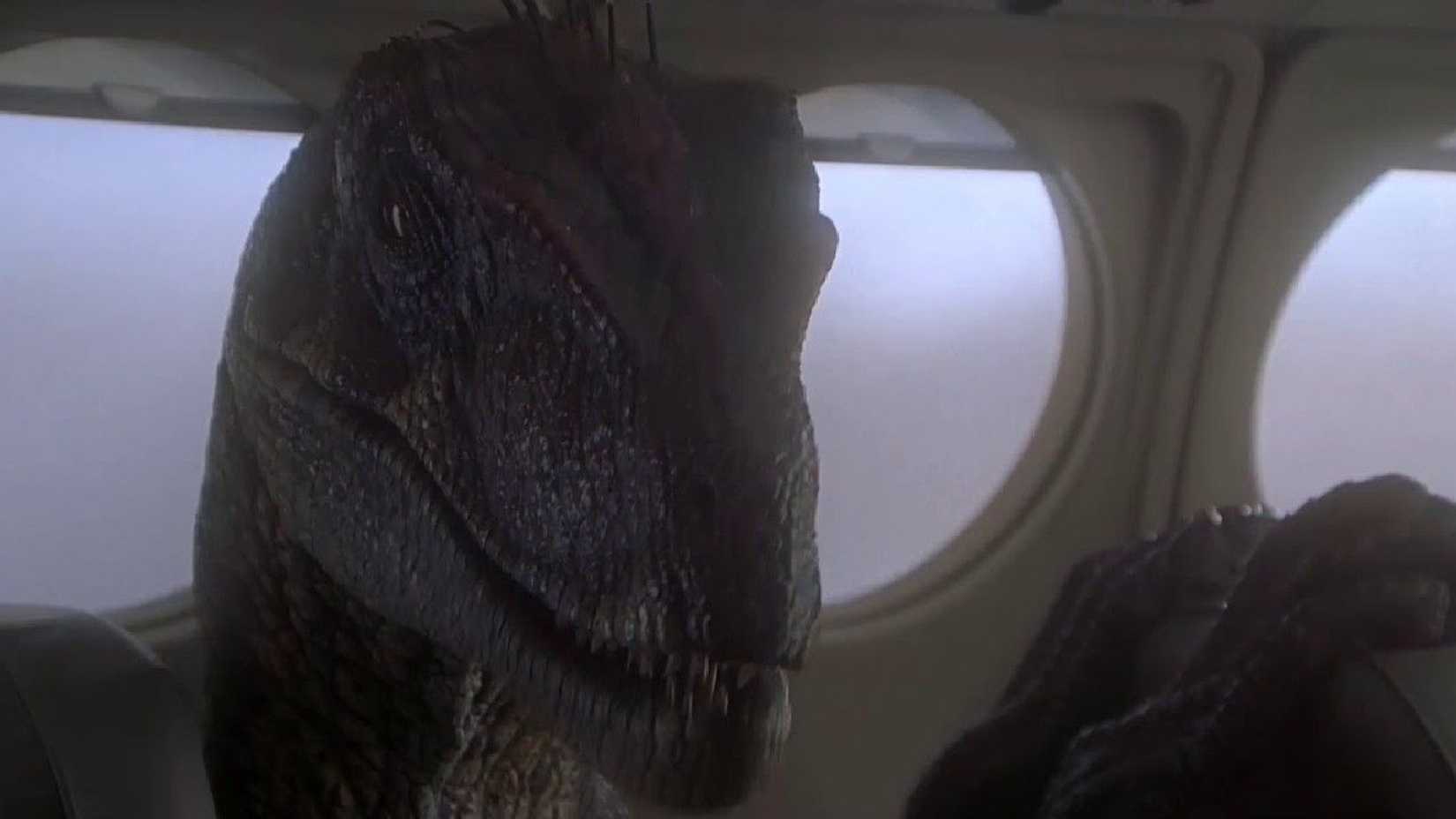 A raptor on a plane during Alan Grant's (Sam Neill) dream in Jurassic Park 3