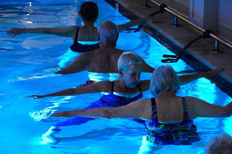 DENVER, CO - JULY 7: Yoga instructor Rebecca Watson leads seniors in a Hatha aqua yoga class at Balfour at Riverfront Park in Denver, Colorado on July 7th, 2015.  Seniors are looking for more active lives into their retirement. (Photo By Helen H. Richardson/ The Denver Post)