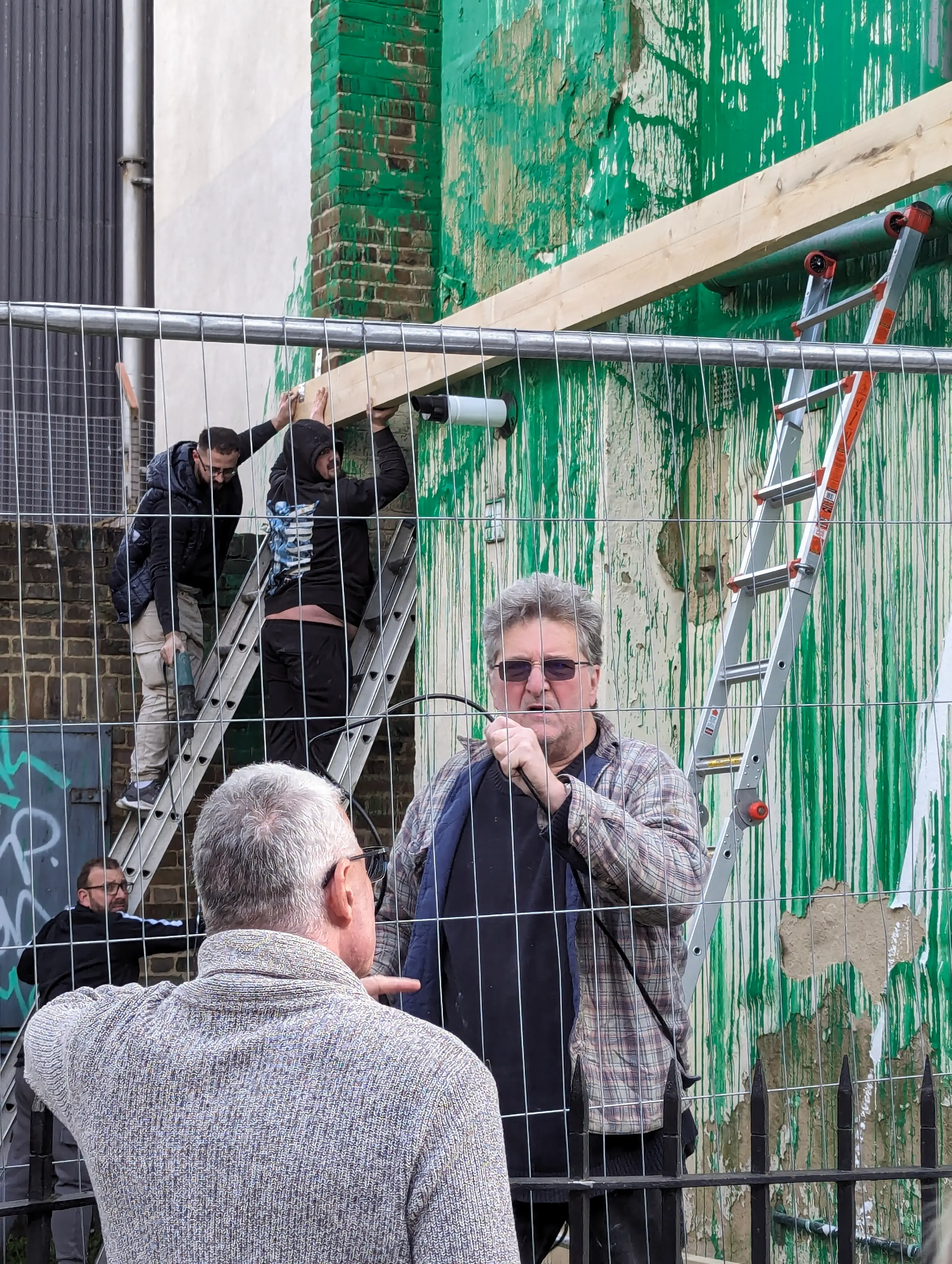 George Georgiou was previously mistaken for Bansky after being spotted at one of his murals in London in 2024 (SWNS)